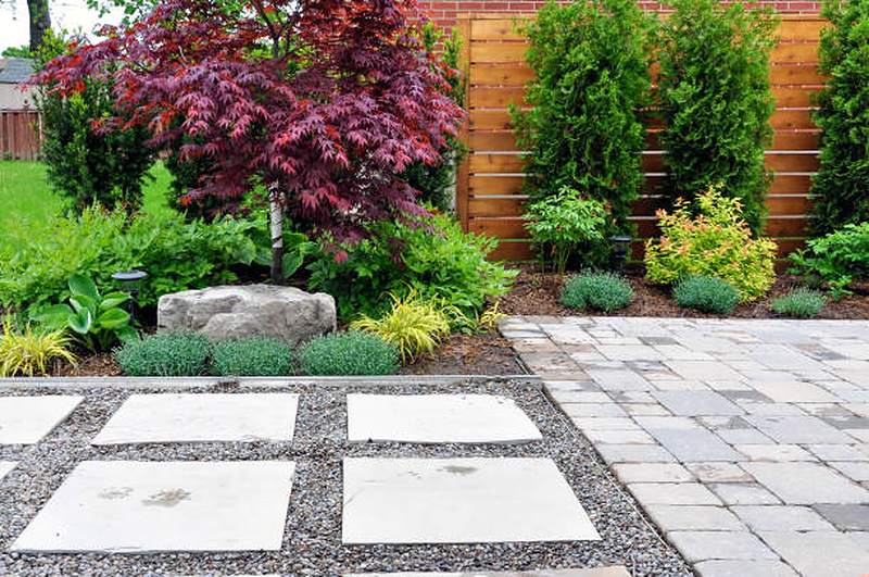 Stepping-stone pavers in gravel beside patio paving, Waterkloof