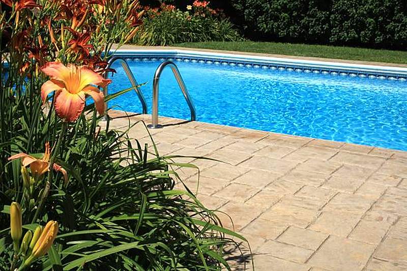 Pool with paved surround and flower beds, Waterkloof