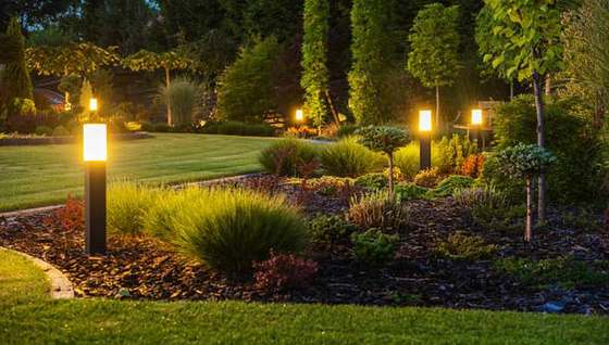 Landscape design with garden lighting and mulched beds, Midstream Estate